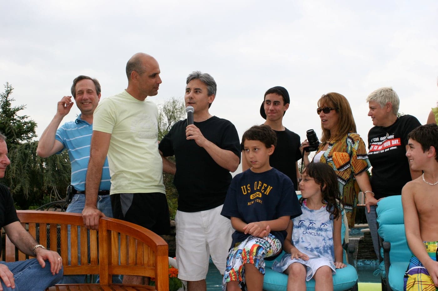 Scott speaking with friends and family at a Zahal Shalom gathering